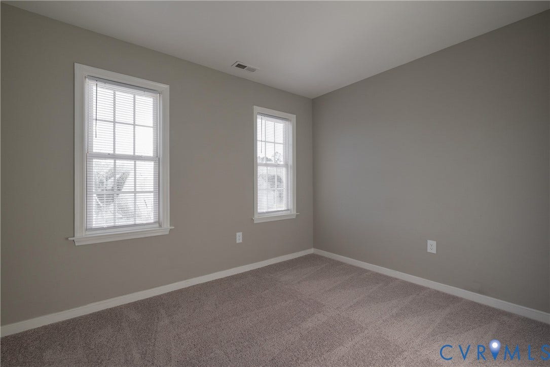 7009 Summers Trace Court, Chesterfield, VA 23832 Bedroom #3 with neutral-toned room featuring wall-to-wall carpeting and dual double-hung windows with colonial-style grilles