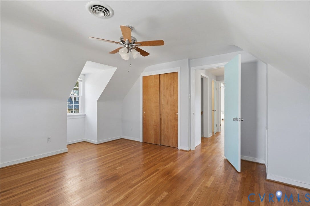 5028 Devonshire Road, Richmond, VA 23225 Room featuring wood-finish flooring, a dormer window, and a ceiling fan with integrated light fixture