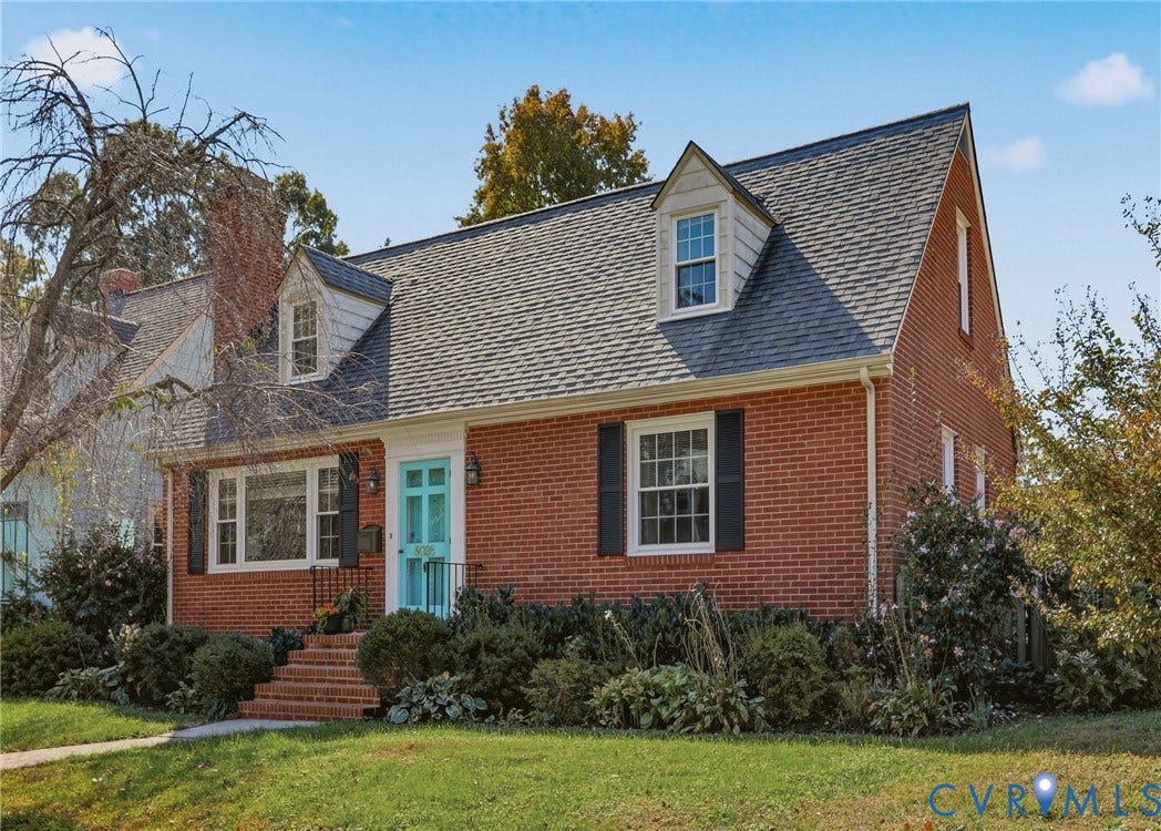 5028 Devonshire Road, Richmond, VA 23225 Traditional brick exterior featuring dual gabled dormers, a gable roof, and decorative shutters