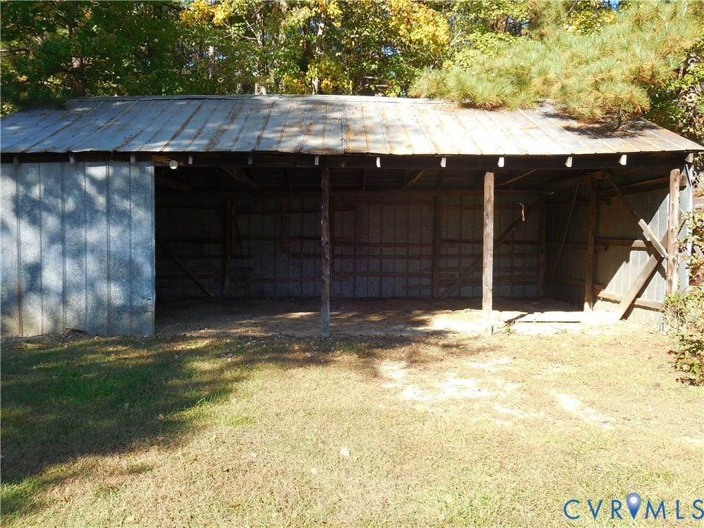 25 Bethany Church Road, Bumpass, VA 23024 Open-air structure featuring metal siding, a corrugated metal roof, and post-and-beam construction