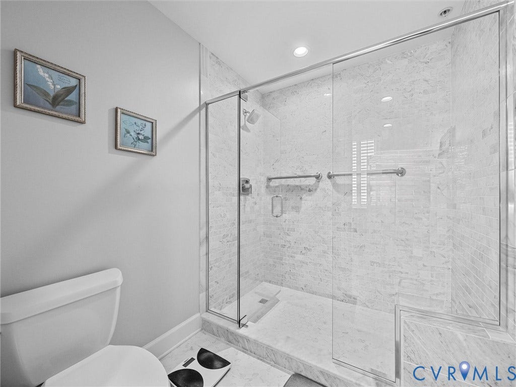 413 Stuart Circle, #3B, Historic Fan District, Richmond, VA 23220 Marble tiled shower with low threshold.