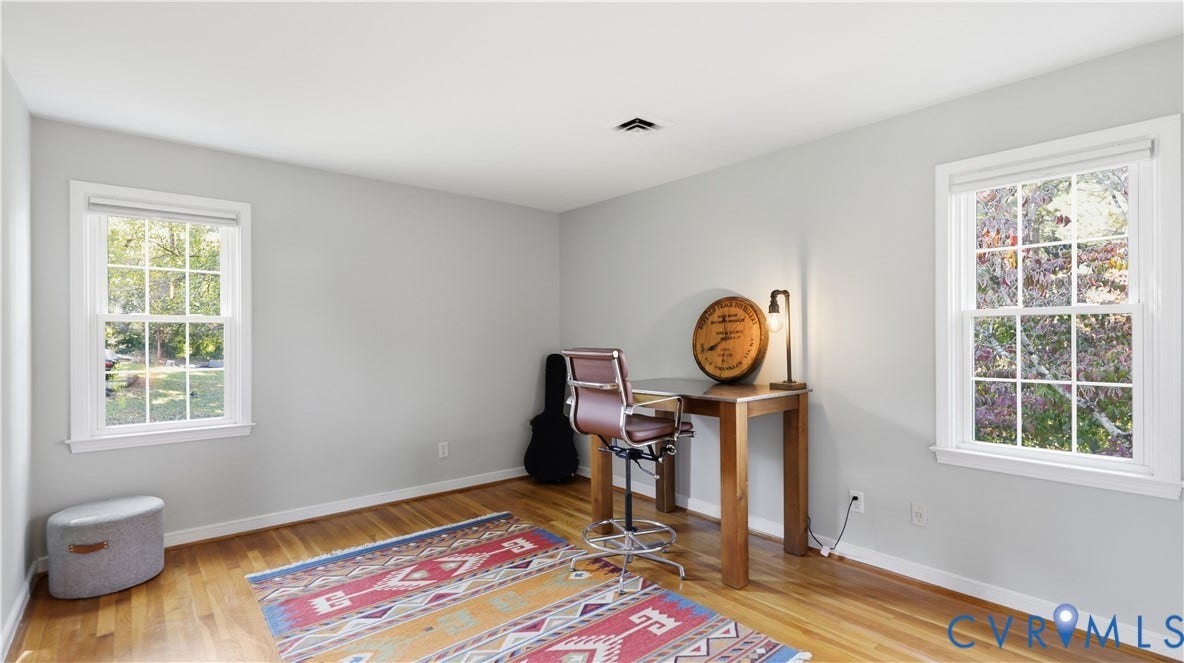 10010 Cheyenne Court, Richmond, VA 23235 Room featuring wood-finish flooring, neutral wall paint, and dual multi-pane windows