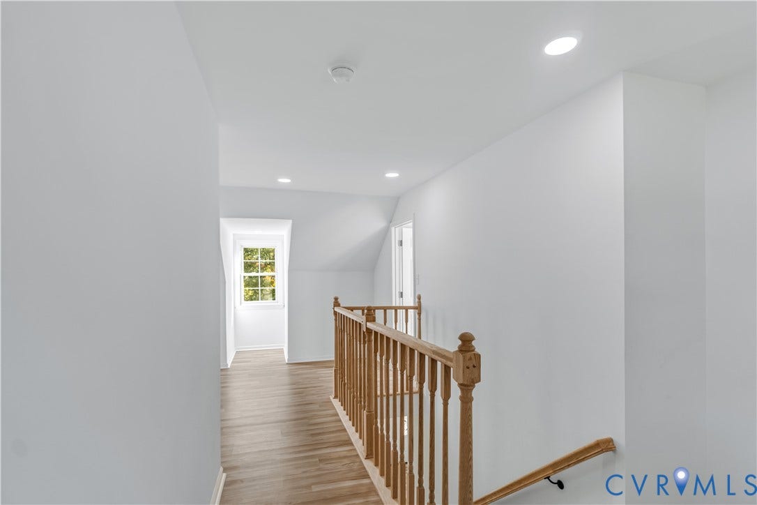 19614 Manson Church Road, Mc Kenney, VA 23872 Hallway featuring wood-finish flooring, recessed lighting, and a wooden balustrade with a matching handrail