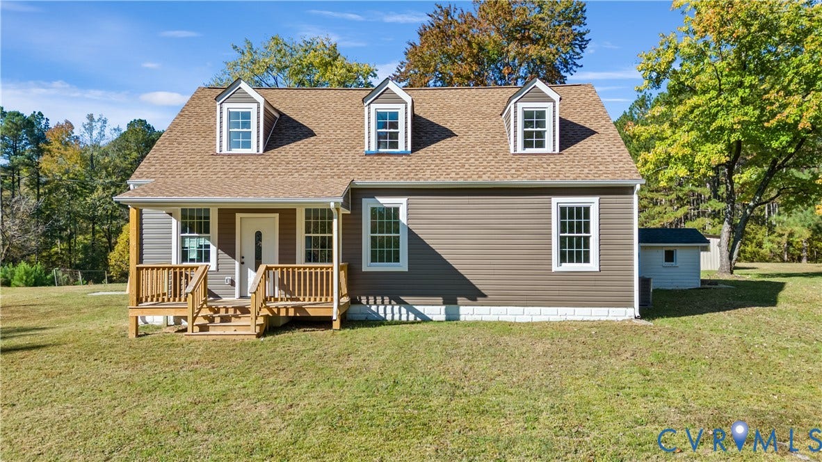19614 Manson Church Road, Mc Kenney, VA 23872 Cape Cod exterior featuring horizontal siding, a shingled roof, three dormer windows, and a raised wooden porch
