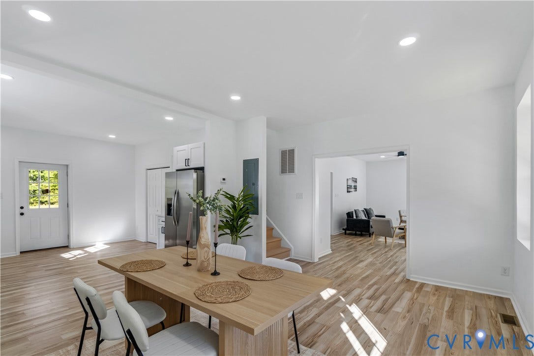 19614 Manson Church Road, Mc Kenney, VA 23872 Open-concept interior featuring wood-finish flooring, recessed lighting, and a stainless steel refrigerator