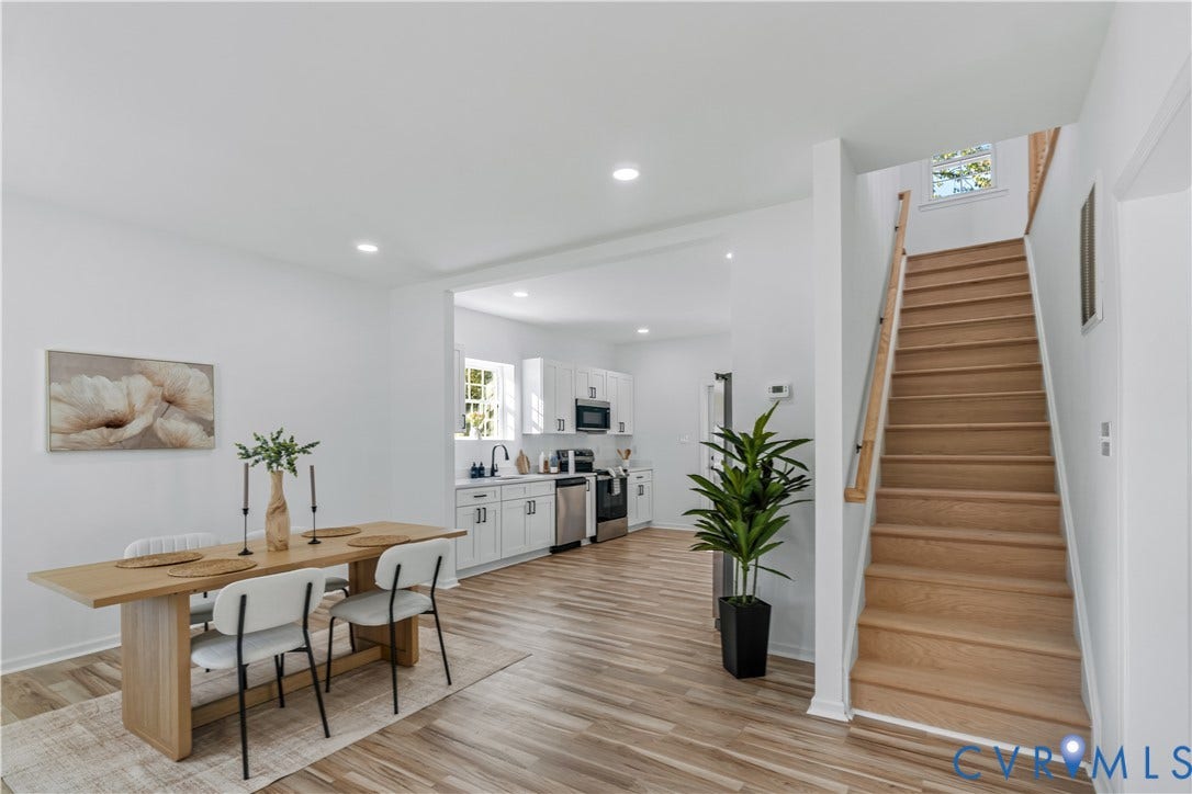 19614 Manson Church Road, Mc Kenney, VA 23872 Open-concept interior featuring wood-finish flooring, recessed lighting, and a staircase with a wooden handrail