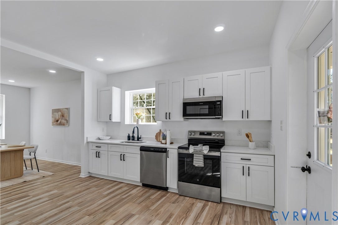 19614 Manson Church Road, Mc Kenney, VA 23872 Kitchen featuring white shaker-style cabinetry, stainless steel appliances, wood-finish flooring, recessed lighting, and a matte black faucet