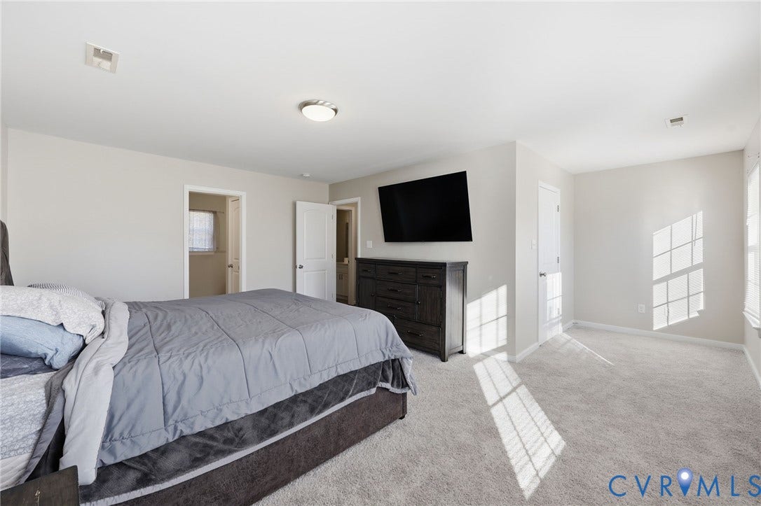 6614 Gills Gate Drive, Chesterfield, VA 23832 Neutral wall tones, wall-to-wall carpeting, multiple doorways, and flush-mount ceiling lighting