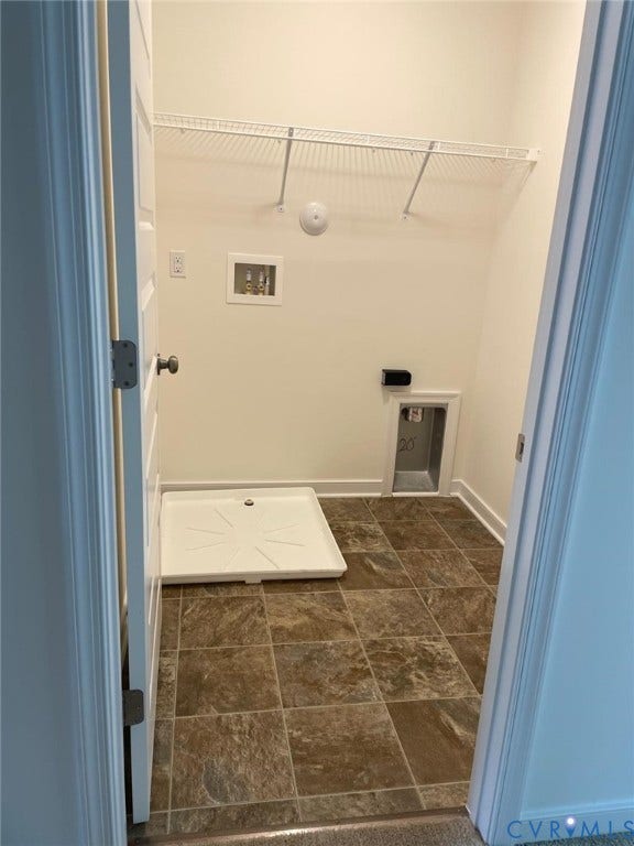 10823 Farmstead Mill Drive, Henrico, VA 23059 Laundry room featuring dark tile patterned flooring, hookup for a washing machine, electric dryer hookup, and hookup for a gas dryer
