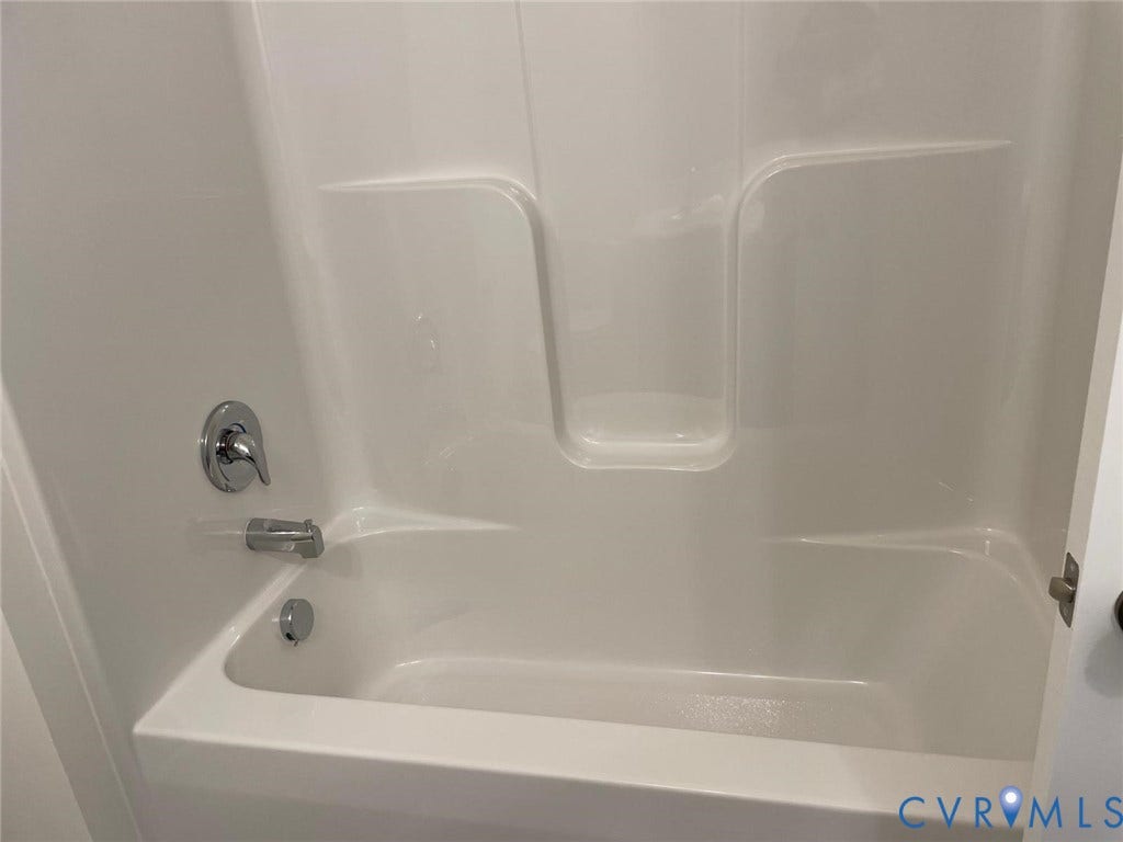 10823 Farmstead Mill Drive, Henrico, VA 23059 Bathroom featuring tub / shower combination