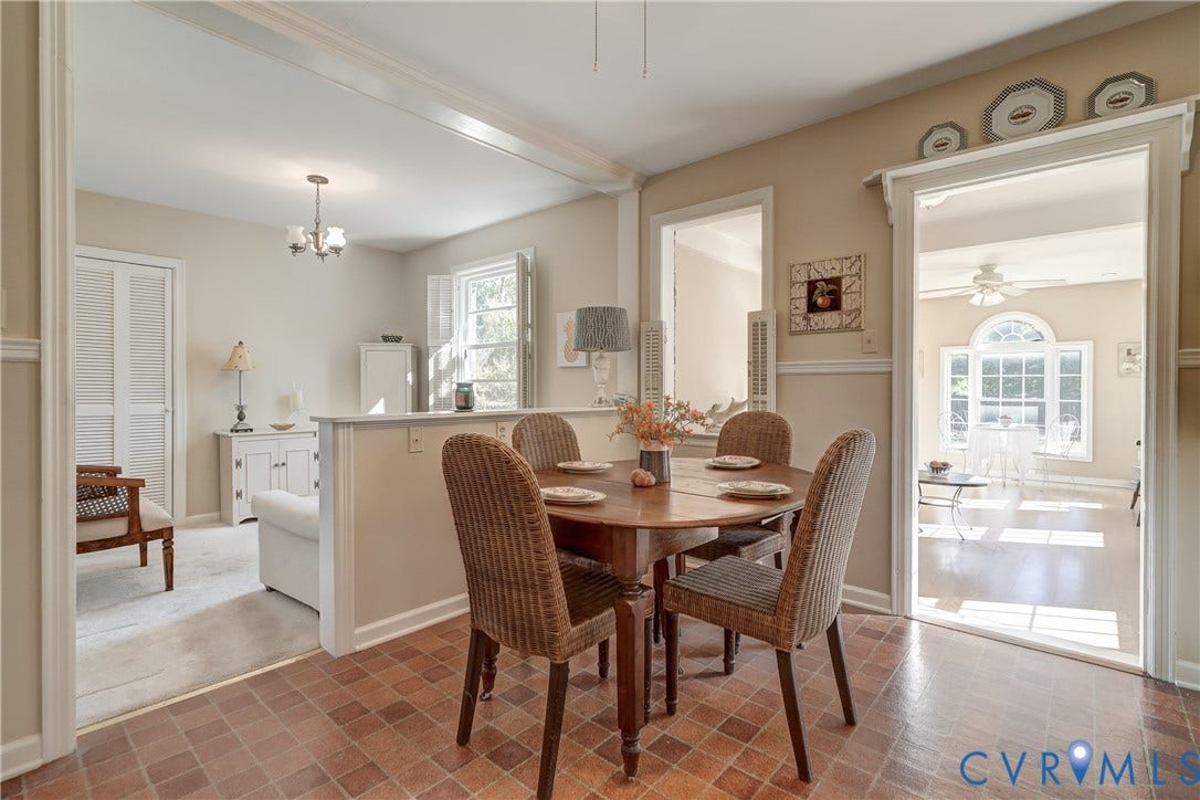 409 Lilliston Avenue, Colonial Heights, VA 23834 Dining area featuring ceramic tile flooring, chair rail molding, and a partial wall divider