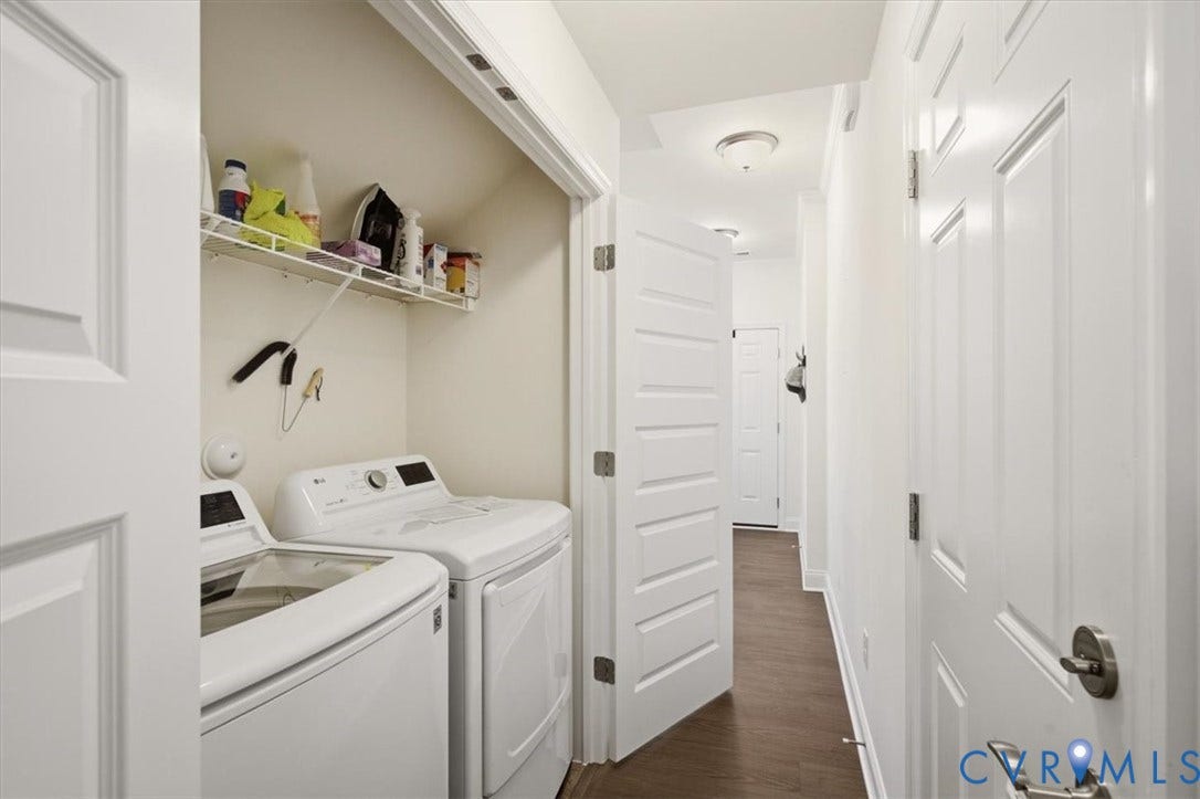 18743 Palisades Ridge, Palisades Cove, Moseley, VA 23120 Laundry closet featuring built-in wire shelving, white panel doors, and wood-finish flooring