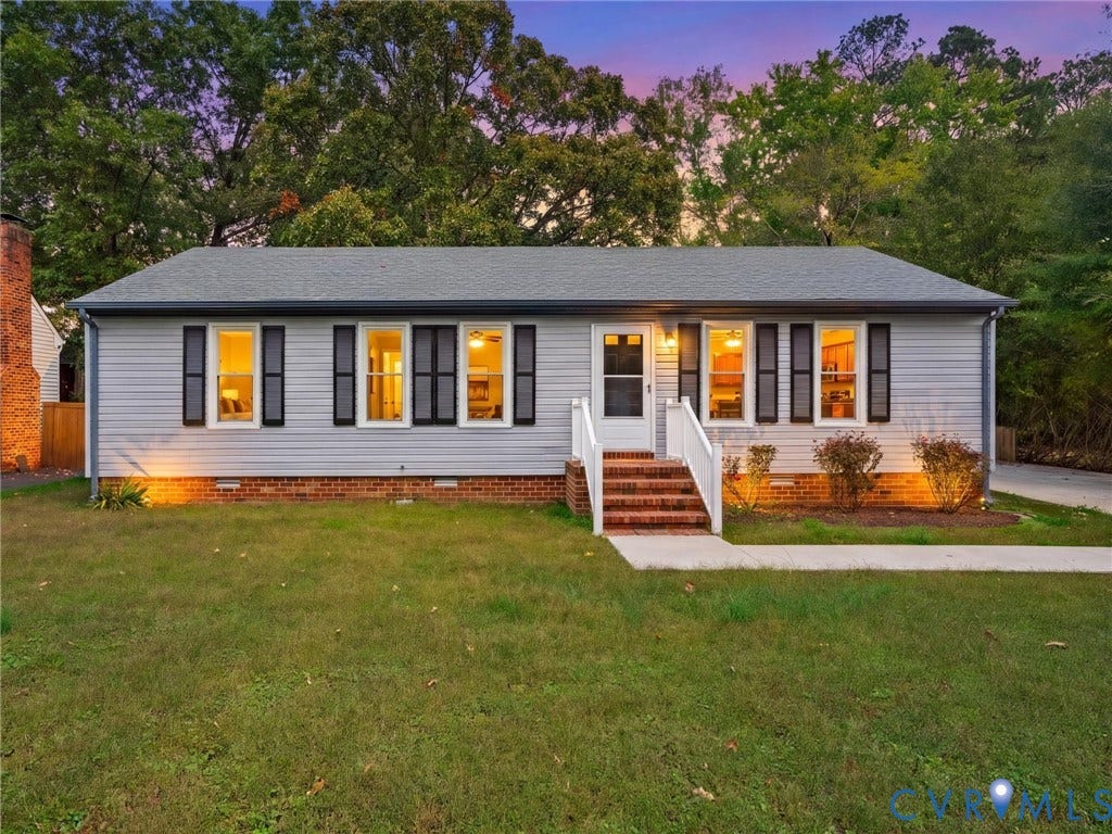 5504 Chanson Road, Salem Woods, North Chesterfield, VA 23237 Single-story exterior featuring horizontal siding, dark decorative shutters, brick foundation trim, and a brick front stoop with a white railing