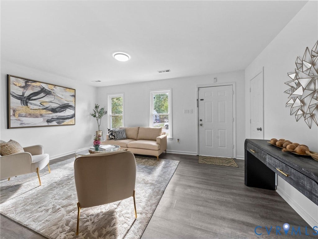 5504 Chanson Road, Salem Woods, North Chesterfield, VA 23237 Neutral interior featuring wood-finish flooring, white walls, double-pane windows, and a flush-mount ceiling light fixture