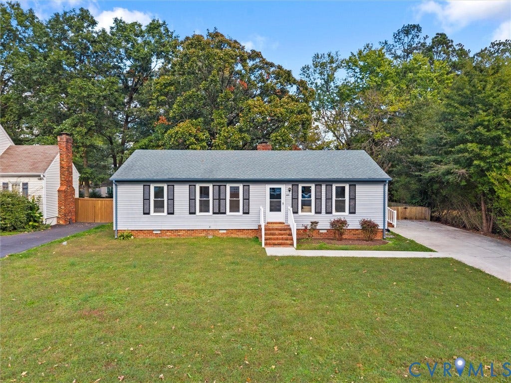 5504 Chanson Road, Salem Woods, North Chesterfield, VA 23237 Ranch-style exterior featuring light-toned horizontal siding, decorative window shutters, a brick foundation, and a concrete driveway
