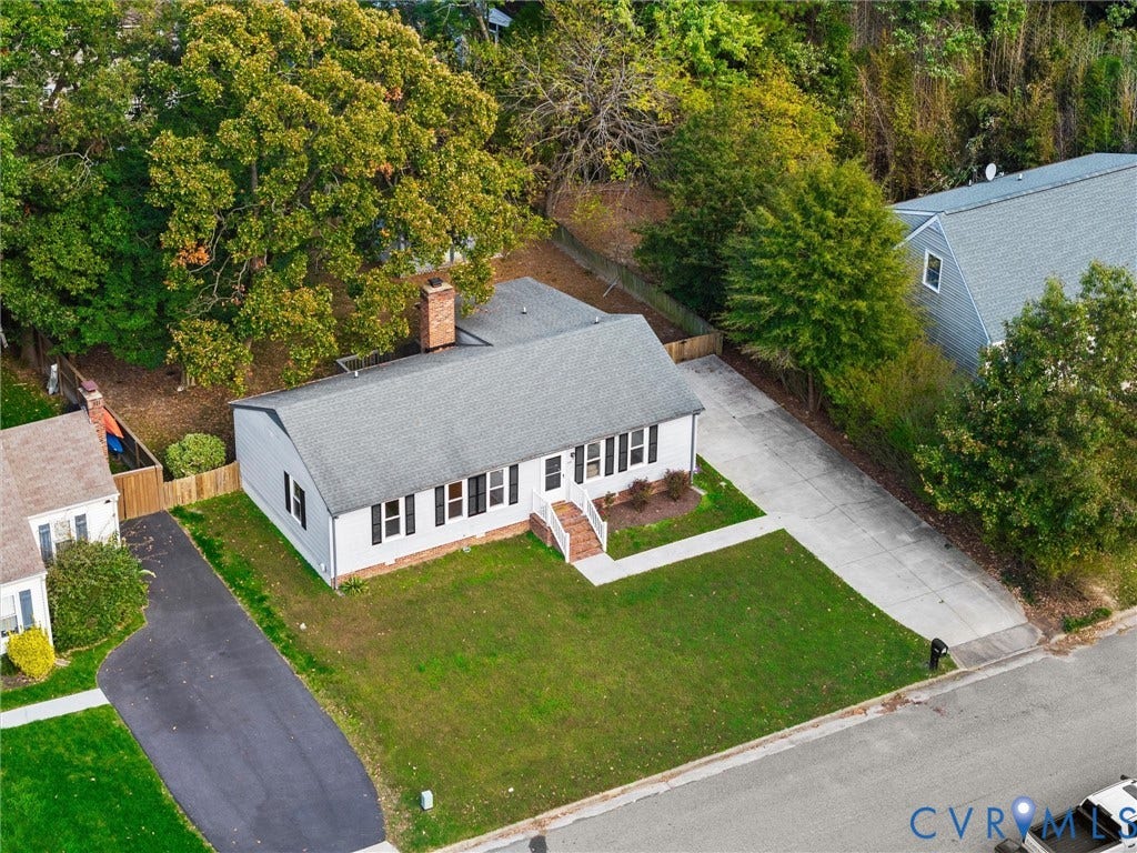 5504 Chanson Road, Salem Woods, North Chesterfield, VA 23237 Single-story residence featuring light-colored siding, a brick chimney, a concrete driveway, a front lawn, and a shingled roof