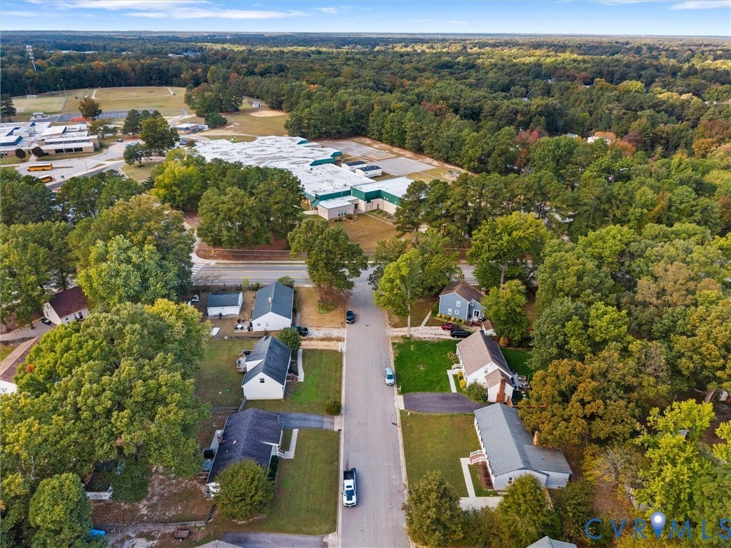 5504 Chanson Road, Salem Woods, North Chesterfield, VA 23237 Aerial perspective of a residential street featuring mature trees and expansive green space