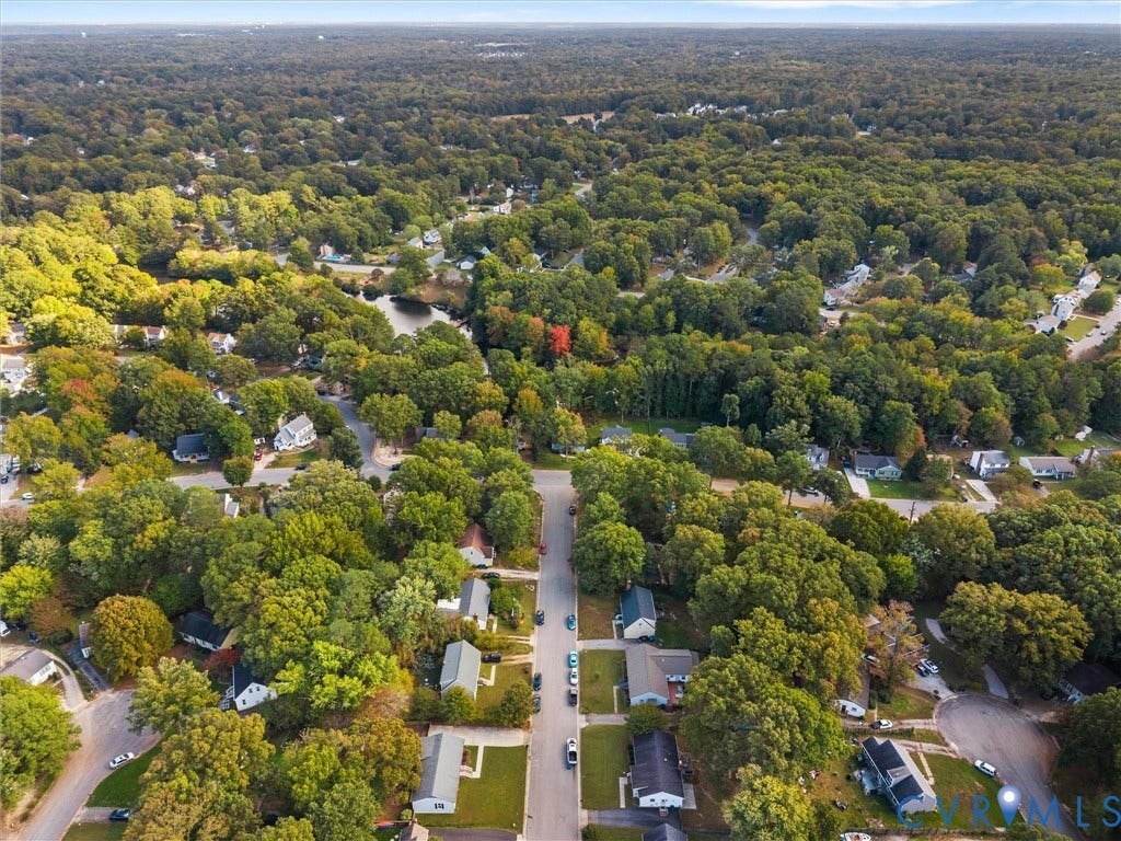 5504 Chanson Road, Salem Woods, North Chesterfield, VA 23237 Aerial perspective featuring dense canopy coverage, established vegetation, and a natural pond setting