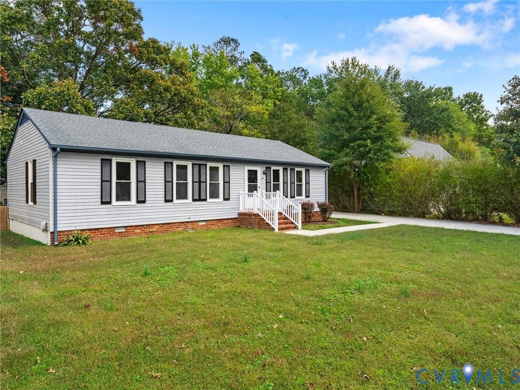 5504 Chanson Road, Salem Woods, North Chesterfield, VA 23237 Single-story exterior featuring gray vinyl siding, a gabled roof, dark shutter accents, brick foundation trim, and a white railing entry