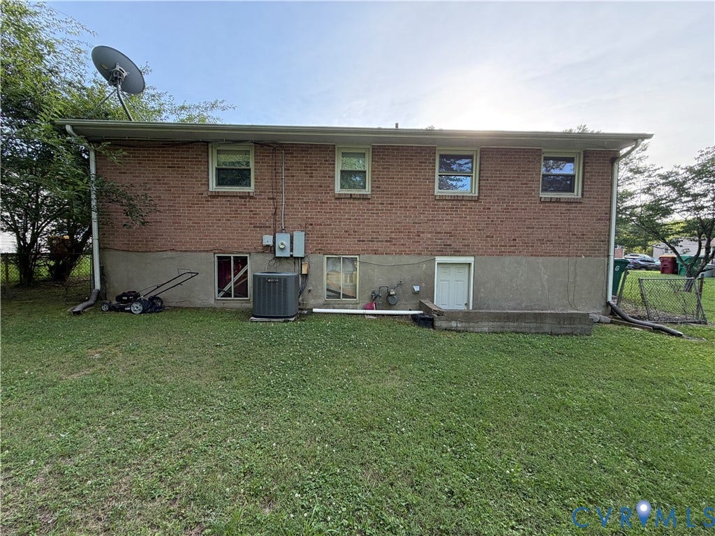 1513 West Lane, Petersburg, VA 23803 Brick exterior finish, concrete foundation, and multi-pane windows
