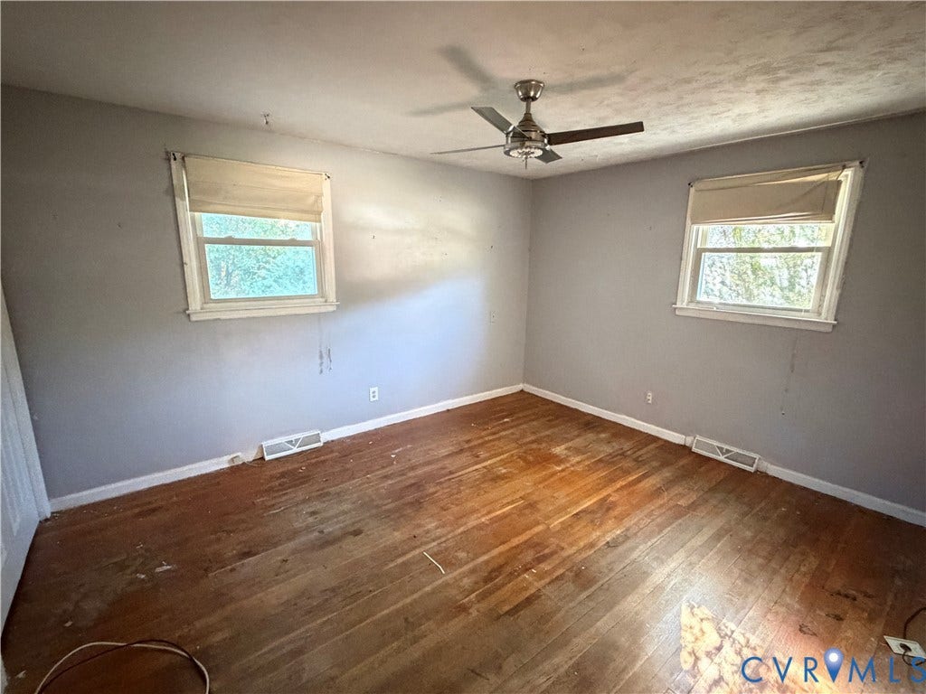 1513 West Lane, Petersburg, VA 23803 Wood-finish flooring, dual windows with built-in shades, and a ceiling-mounted light fixture
