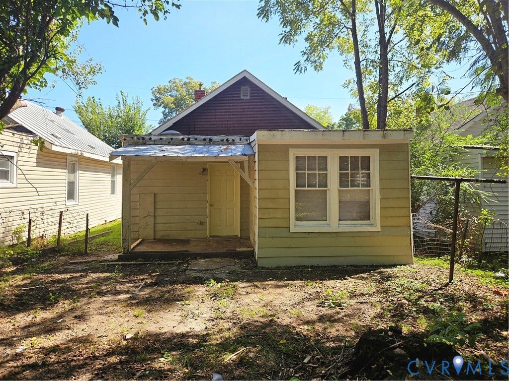 3503 Lawson Street, Richmond, VA 23224 Exterior featuring horizontal siding, a covered porch, and double-hung windows
