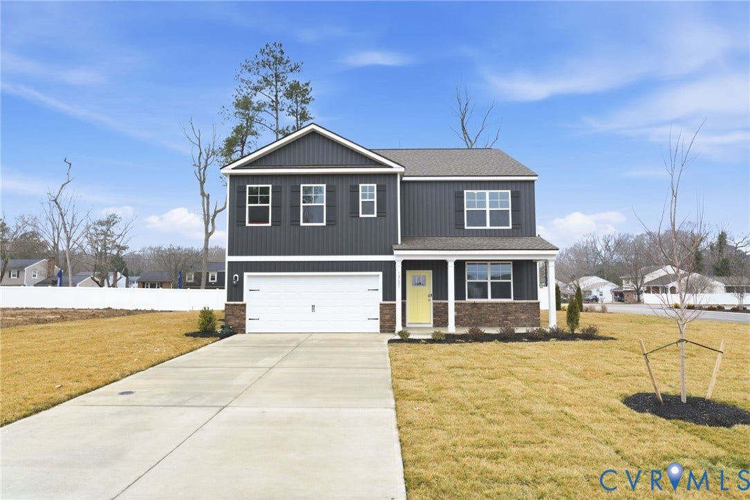 11231 Chappell Creek Circle, Chappell Creek, North Prince George, VA 23860 Two-story exterior featuring dark gray vertical and horizontal siding