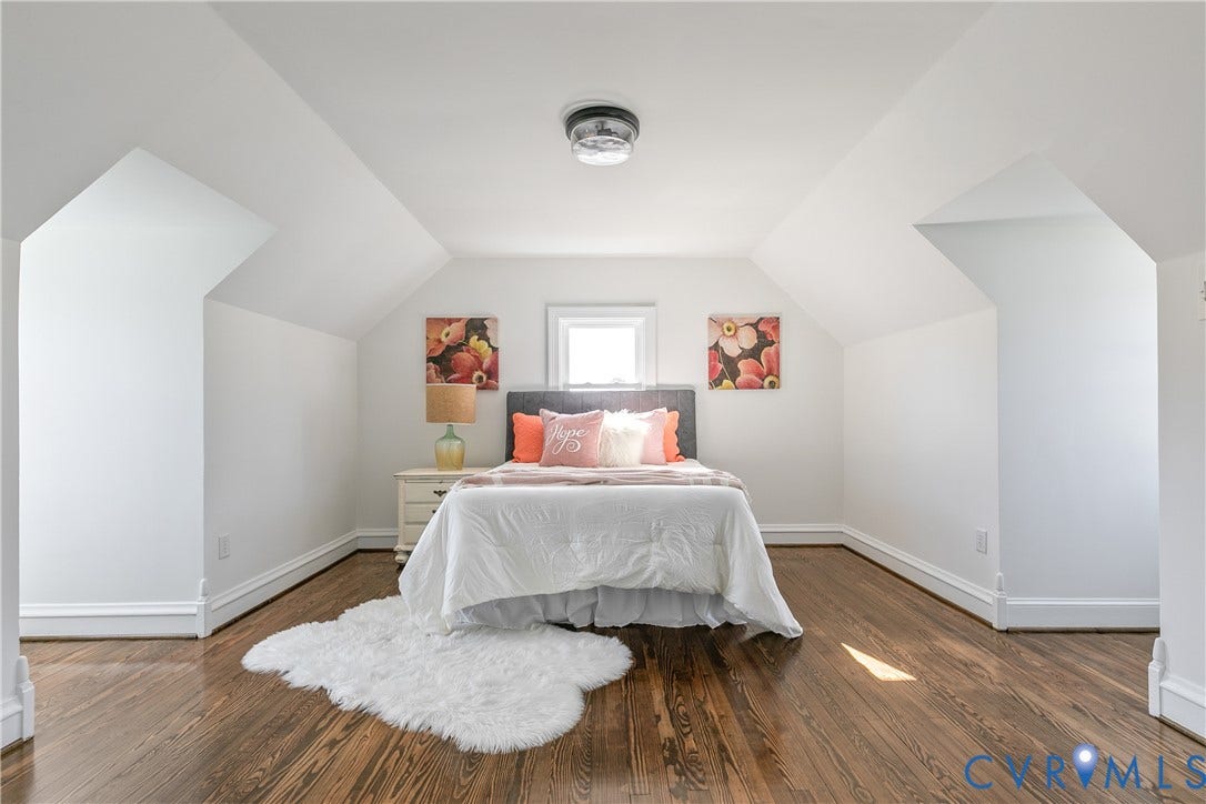 24 N Elm Avenue, Henrico, VA 23075 Vaulted ceilings with dormer-style architecture, wood-finish flooring, and a central ceiling-mounted light fixture