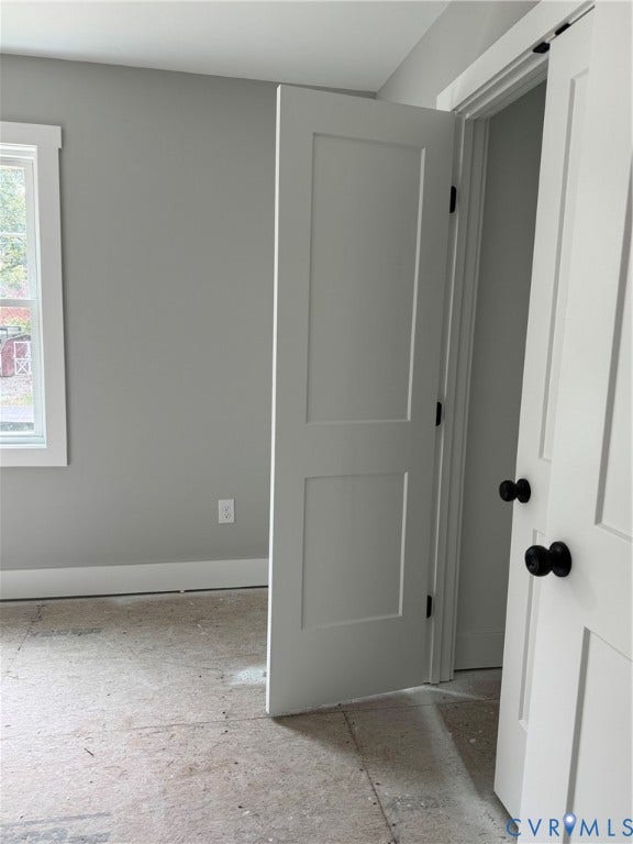 6012 Lakeside Drive, Woodhaven Shores, Quinton, VA 23141 Interior featuring neutral-toned walls, two-panel shaker-style interior doors, and matte black hardware