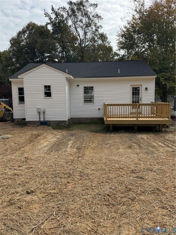6012 Lakeside Drive, Woodhaven Shores, Quinton, VA 23141 Exterior featuring white horizontal siding, a gabled roofline, and an elevated wood deck with perimeter railing