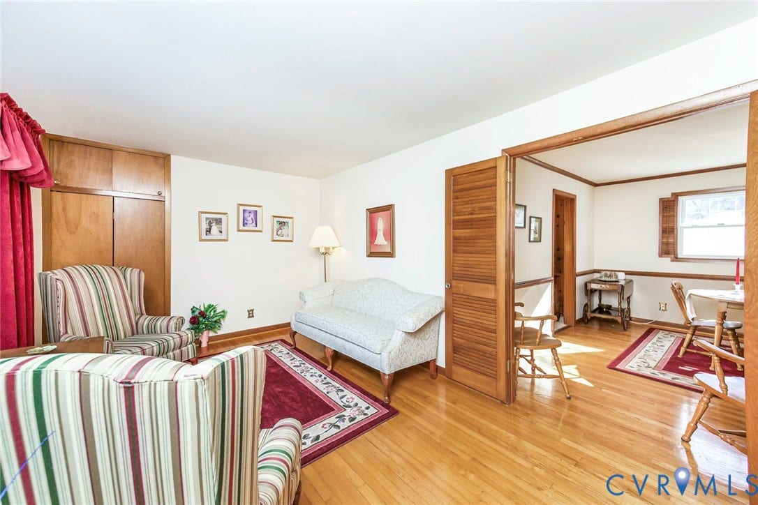 700 Lakeside Drive, Emporia, Emporia, VA 23847 Wood-finish flooring, louvered interior doors, and built-in floor-to-ceiling wooden cabinetry
