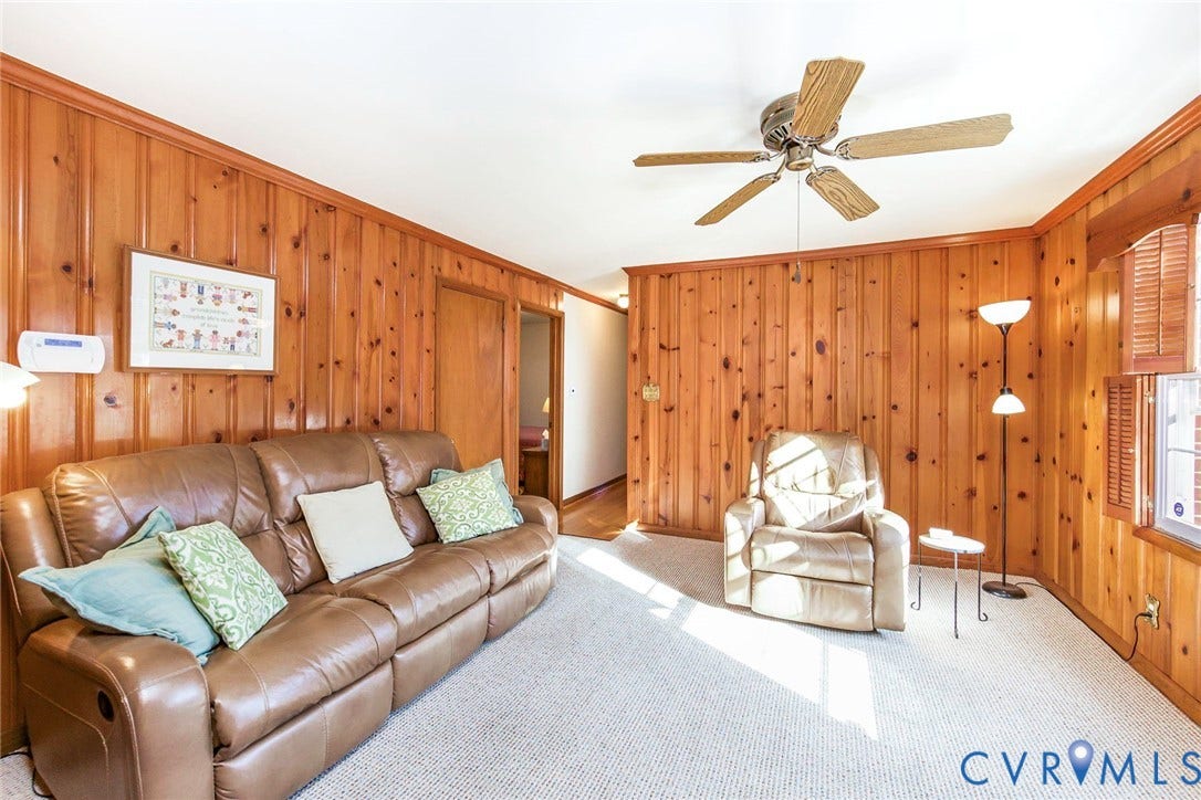 700 Lakeside Drive, Emporia, Emporia, VA 23847 Interior featuring wood paneling, wall-to-wall carpeting, and a ceiling-mounted paddle fan