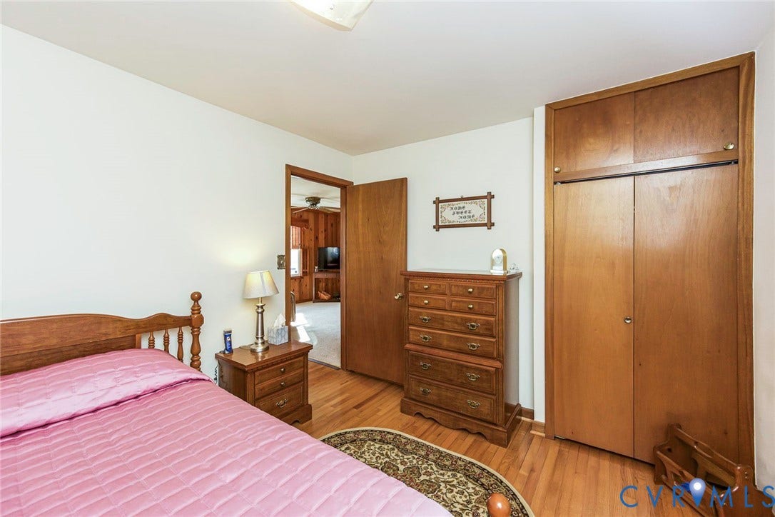700 Lakeside Drive, Emporia, Emporia, VA 23847 Wood-finish flooring, built-in floor-to-ceiling wooden cabinetry, and solid wood interior doors