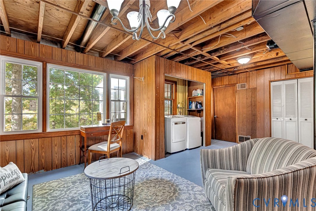 1526 Westshire Lane, Henrico, VA 23238 Wood-paneled walls, exposed timber ceiling joists, multi-pane windows, and dedicated laundry alcove