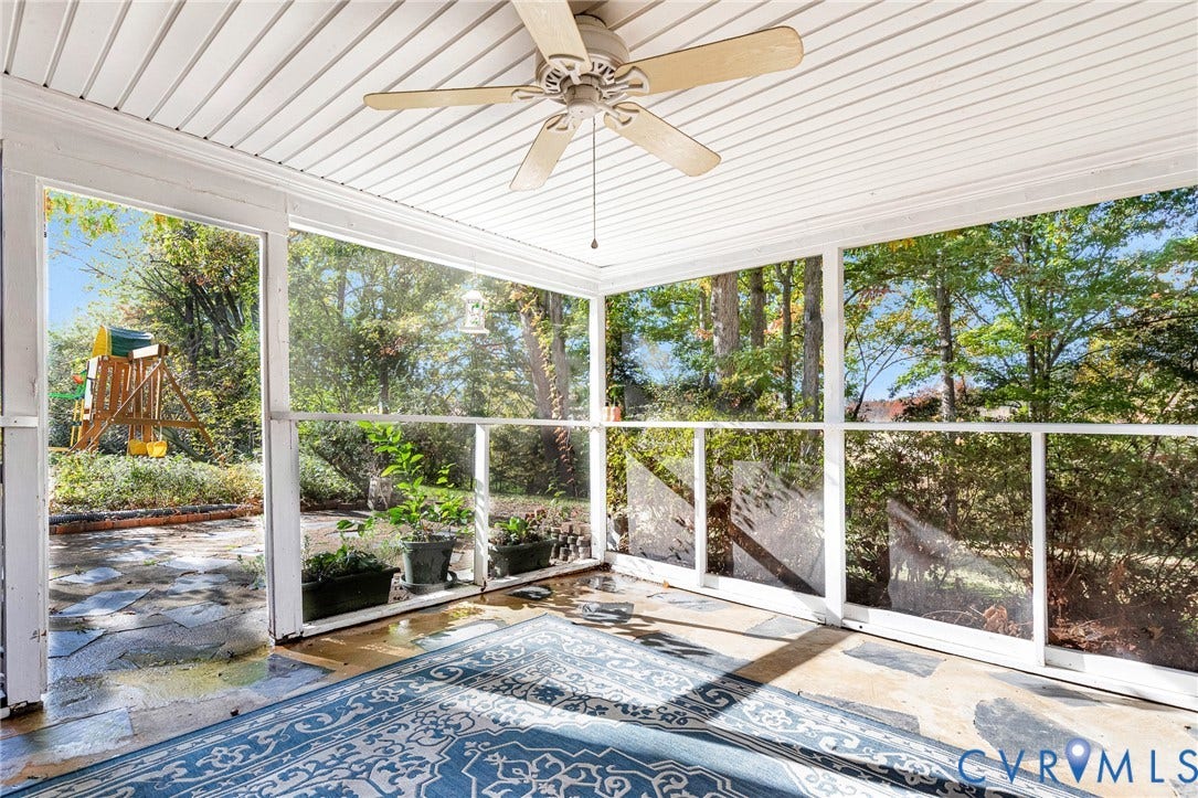 1526 Westshire Lane, Henrico, VA 23238 Screened-in porch featuring a beadboard ceiling, overhead paddle fan, and flagstone flooring