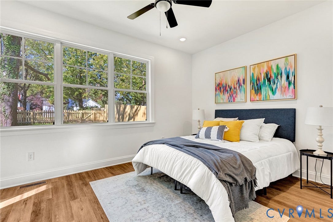 1807.5 Gordon Avenue, Oak Grove, Oak Grove, VA 23224 Large multi-pane window with wood-finish flooring, recessed lighting, and a ceiling-mounted fan