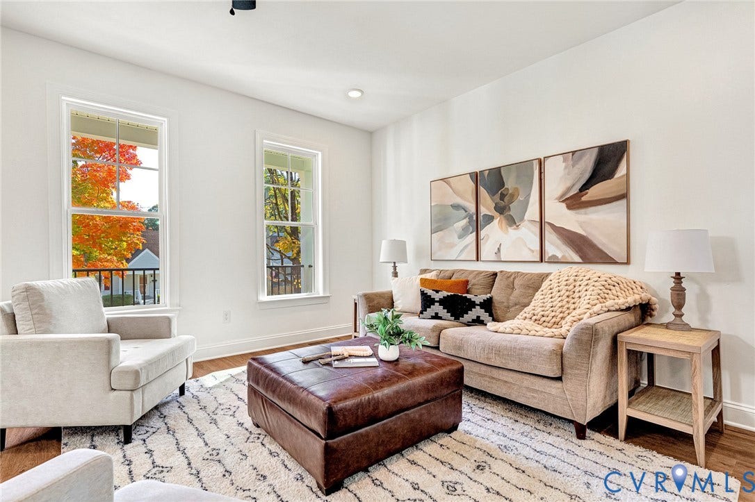 1807.5 Gordon Avenue, Oak Grove, Oak Grove, VA 23224 Living room featuring tall windows with divided lites, recessed lighting, and wood-finish flooring