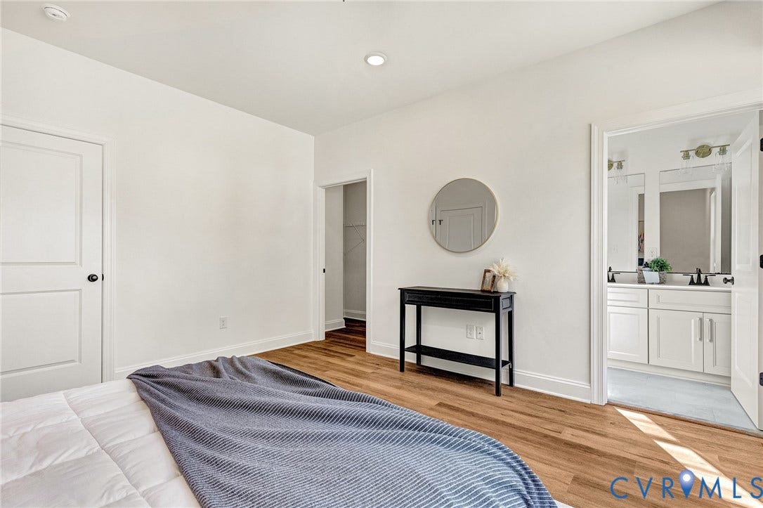 1807.5 Gordon Avenue, Oak Grove, Oak Grove, VA 23224 Room featuring wood-finish flooring, recessed lighting, and white interior doors