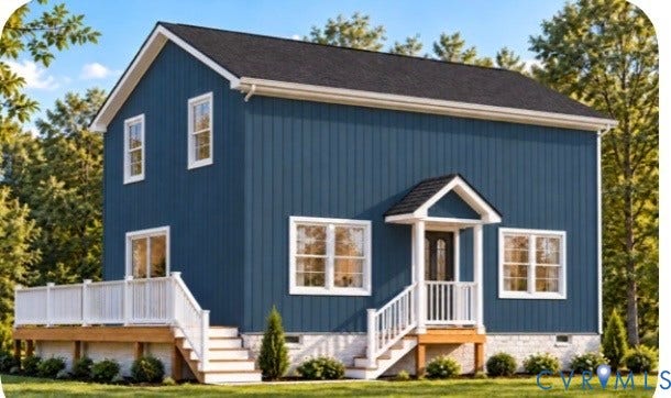 26578 Country Club Lane, Ruther Glen, VA 22546 Two-story residence featuring vertical board-and-batten siding, a stone foundation, a gabled entry portico, and a wood-decked patio with white railing