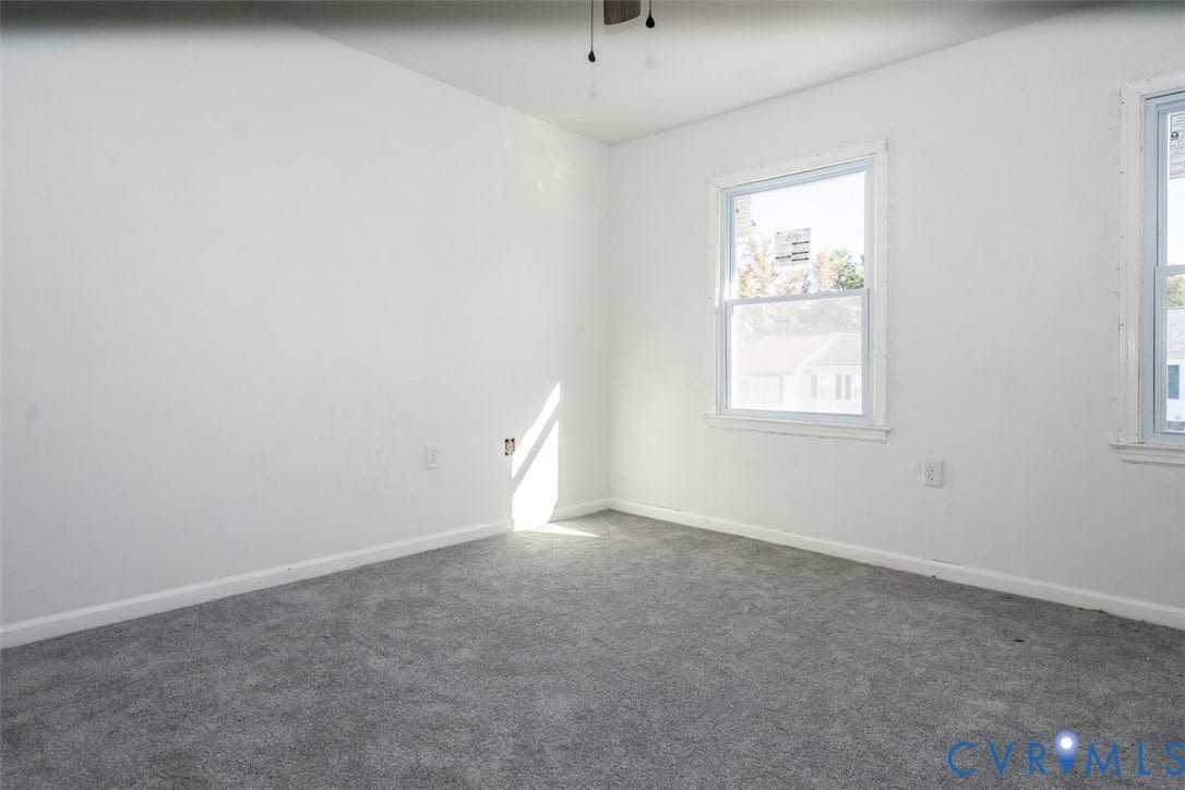 2358 Hill Street, #G, Petersburg, VA 23803 Neutral-toned wall-to-wall carpeting, crisp white wall finish, double-pane vinyl windows, and a ceiling-mounted light fixture