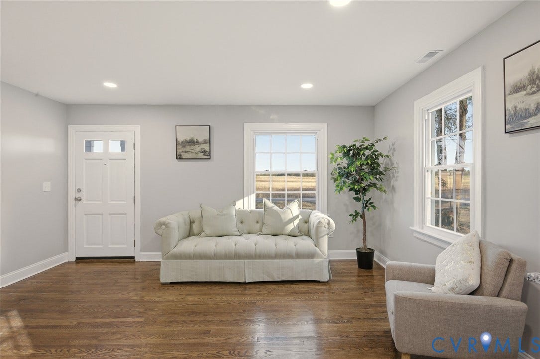 6280 Monahan Road, Henrico, VA 23231 Neutral-toned walls, wood-finish flooring, recessed lighting, and multi-pane windows