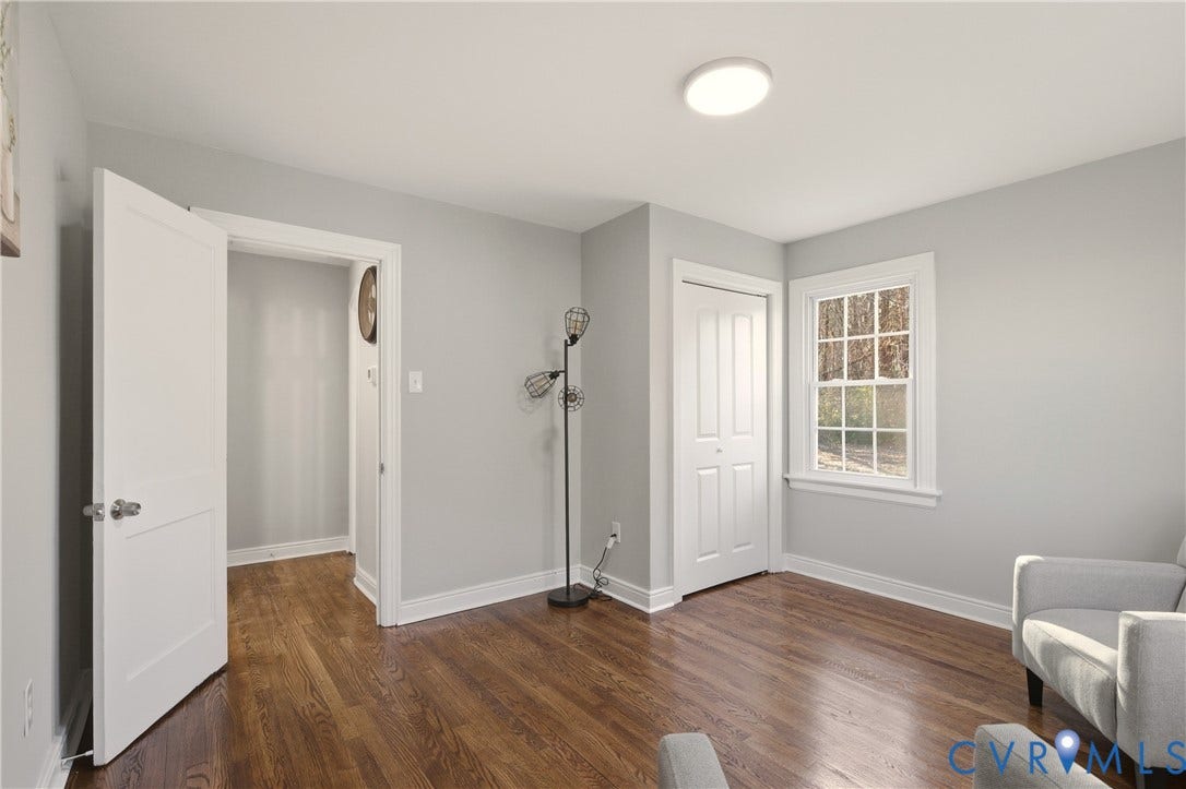 6280 Monahan Road, Henrico, VA 23231 Wood-finish flooring, multi-pane window with white trim, and two-panel interior doors