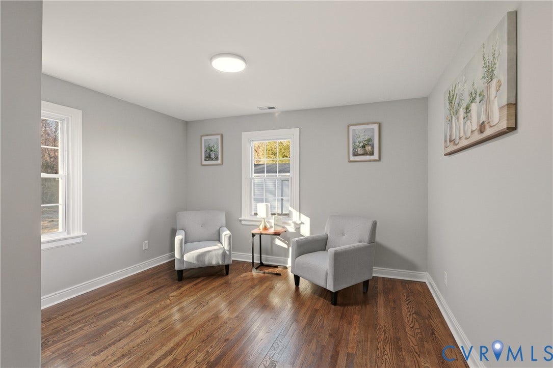 6280 Monahan Road, Henrico, VA 23231 Interior room featuring wood-finish flooring, neutral wall paint, and multi-pane windows with white trim