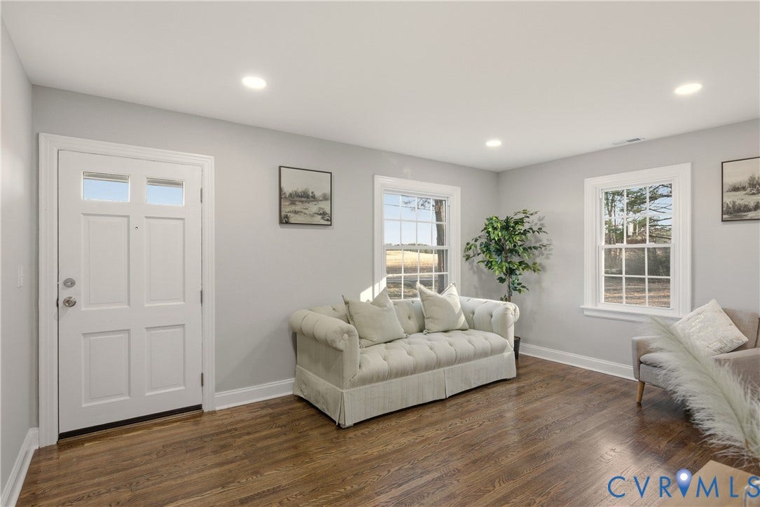 6280 Monahan Road, Henrico, VA 23231 Neutral interior featuring wood-finish flooring, recessed lighting, multi-pane windows, and a six-panel exterior door with glass inserts