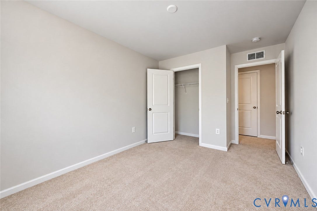 500 Rivanna Hill Way, Glen Allen, VA 23060 Neutral-toned walls, wall-to-wall carpeting, and interior doors with paneled detailing