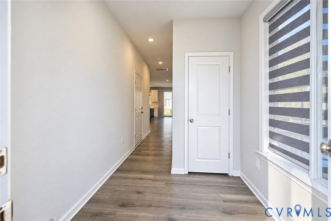 500 Rivanna Hill Way, Glen Allen, VA 23060 Entryway featuring wood-finish flooring, recessed lighting, and a window with installed dual-tone roller shades
