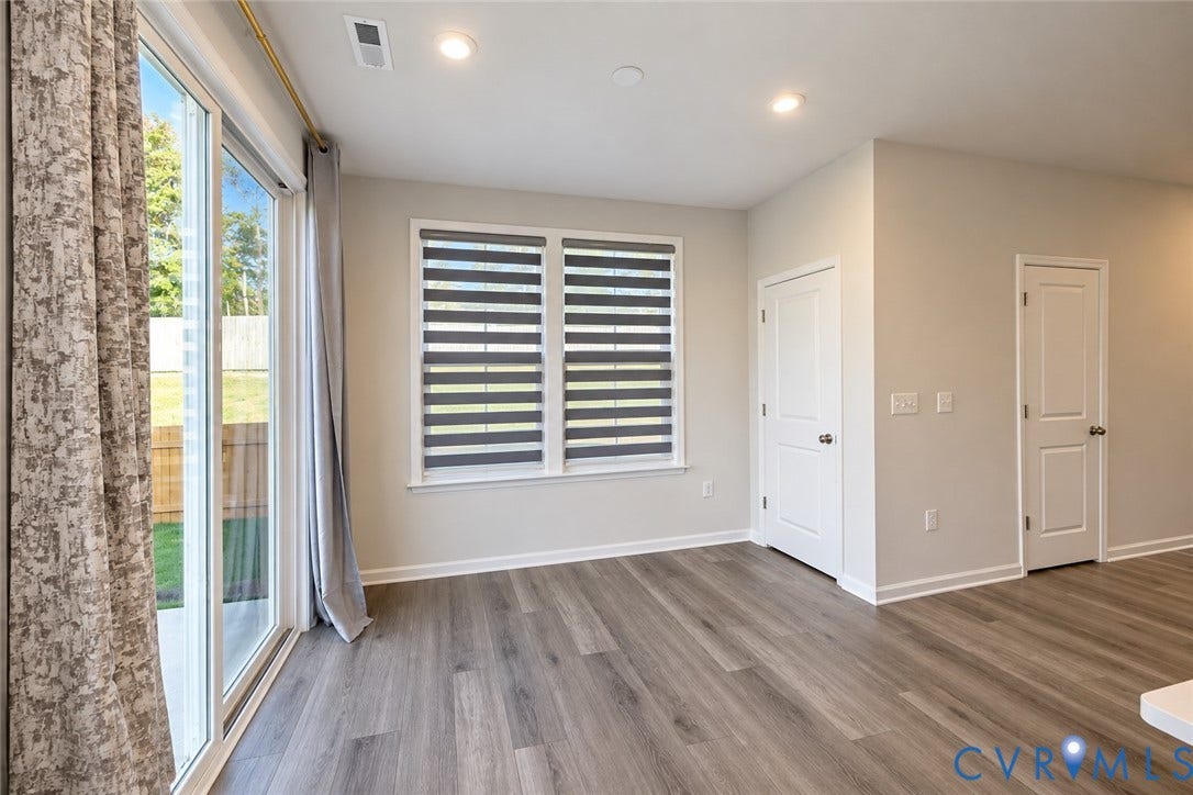 500 Rivanna Hill Way, Glen Allen, VA 23060 Wood-finish flooring, recessed lighting, dual-panel interior doors, and sliding glass door with dual-window configuration