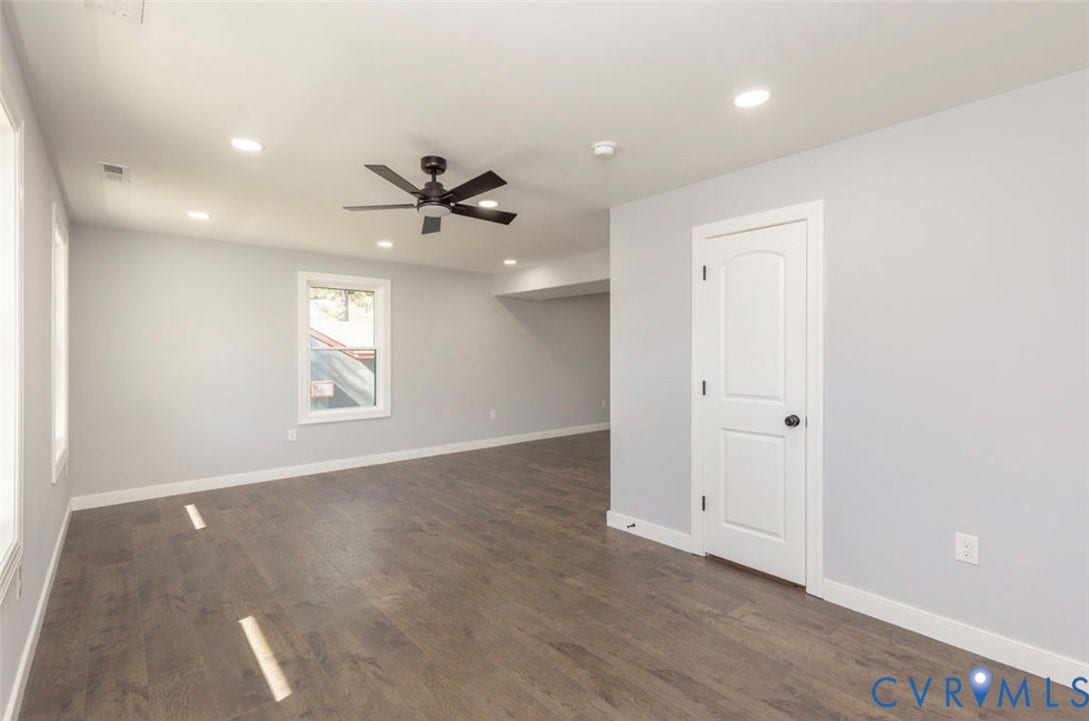 25604 Greensville Avenue, West Petersburg, Dinwiddie, VA 23803 Wood-finish flooring, recessed lighting, matte black ceiling fan, and multi-panel interior door