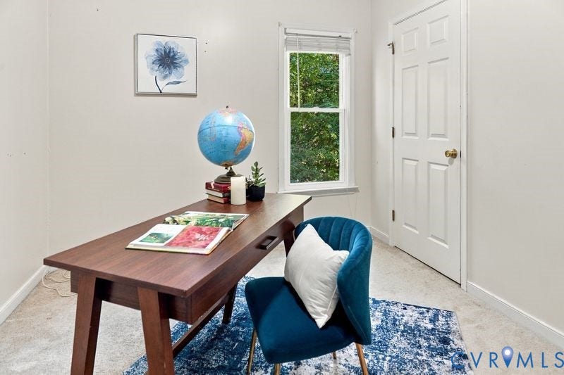 10208 Claybar Trail, Chesterfield, VA 23236 Neutral wall paint, plush carpeting, a single-hung window with natural exterior light, and a six-panel interior door with brass hardware