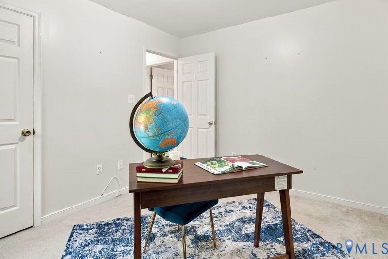 10208 Claybar Trail, Chesterfield, VA 23236 Room featuring white wall finishes, neutral carpeting, and two six-panel interior doors with brass-tone hardware